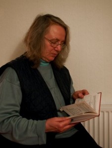 Translator reading Pali book